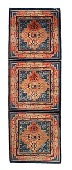 A semi antique chinese meditation rug, ca 159,5 x 57 cm.