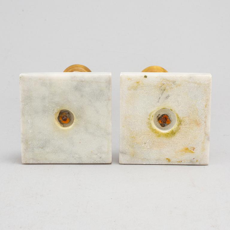 A pair of Gustavians style marble candlesticks, early 20th Century.