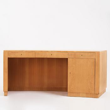 Axel Einar Hjorth, an ashwood veneered desk, Nordiska Kompaniet 1939. The model was designed in 1936.
