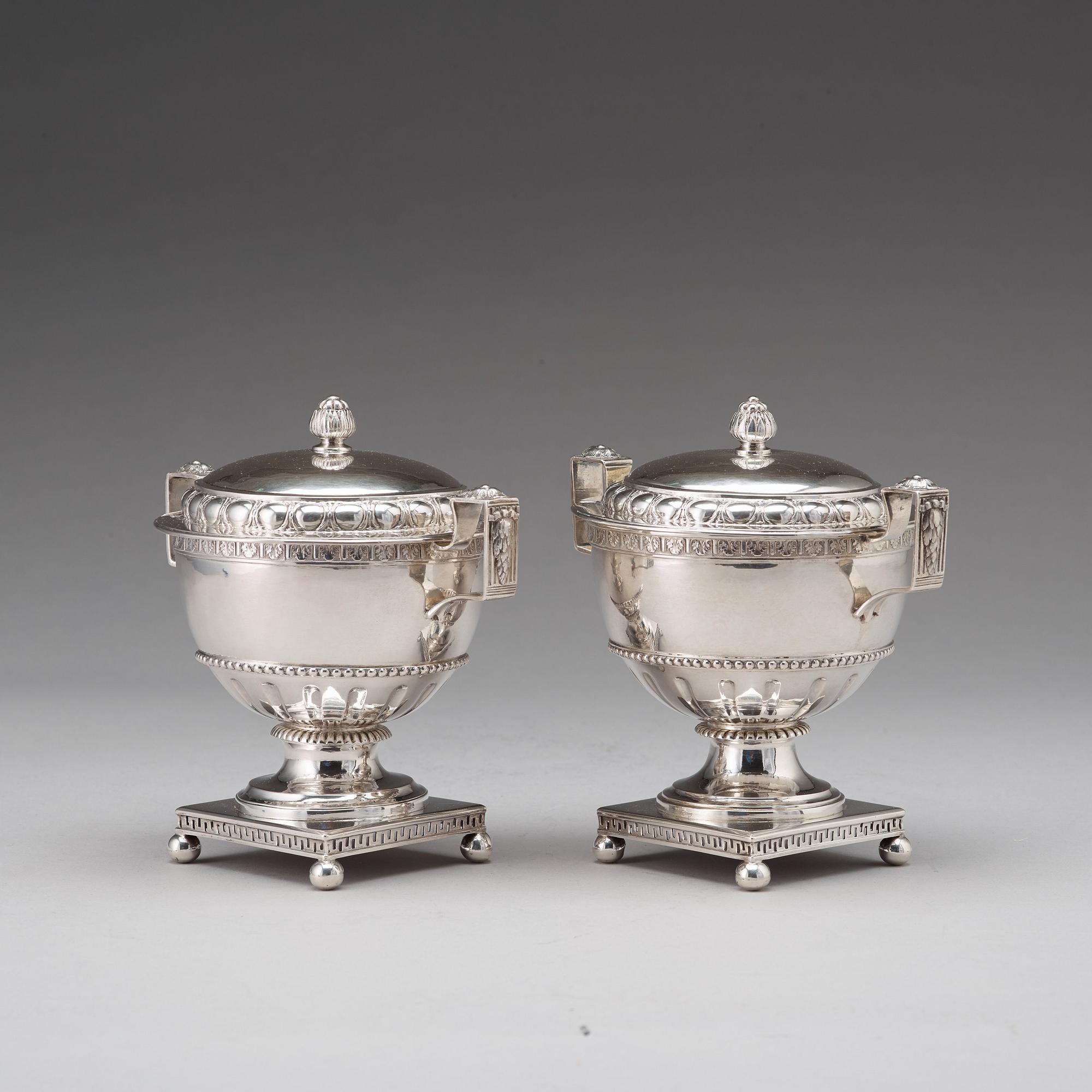 A pair of Swedish late 18th century silver sugar bowls and covers, mark of Pehr Zethelius, Stockholm 1780 and 1781.