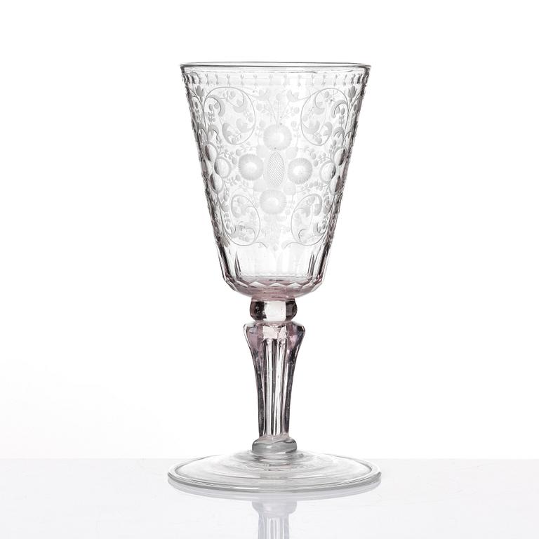 A large engraved and cut glass goblet, 18th Century.