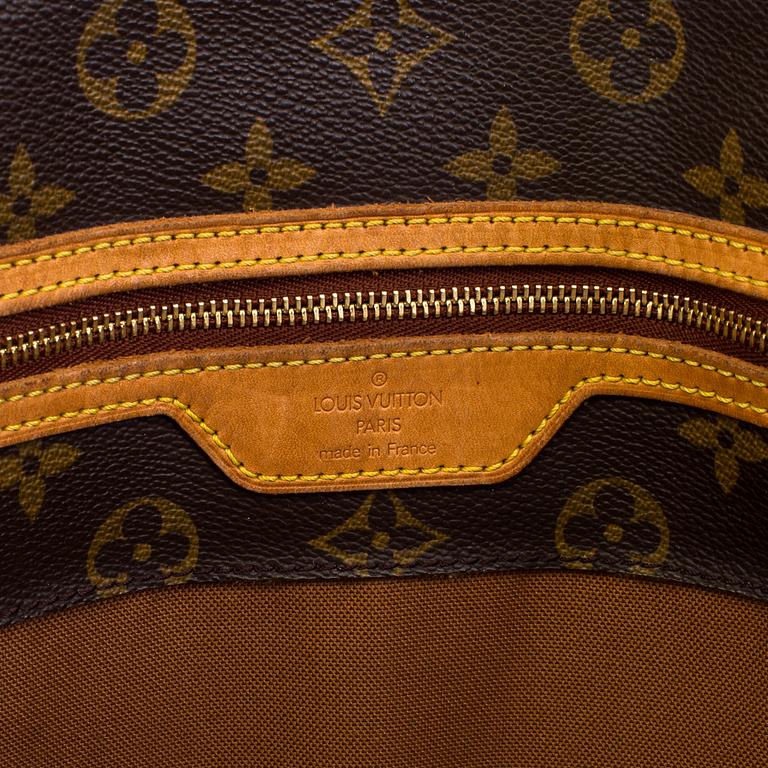 A handbag "Cabas Alto tote bag " by Louis Vuitton.