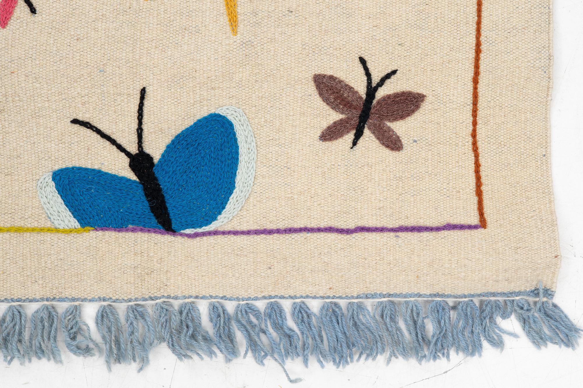 A hand-embroidered kilim carpet, c. 195 x 148 cm.