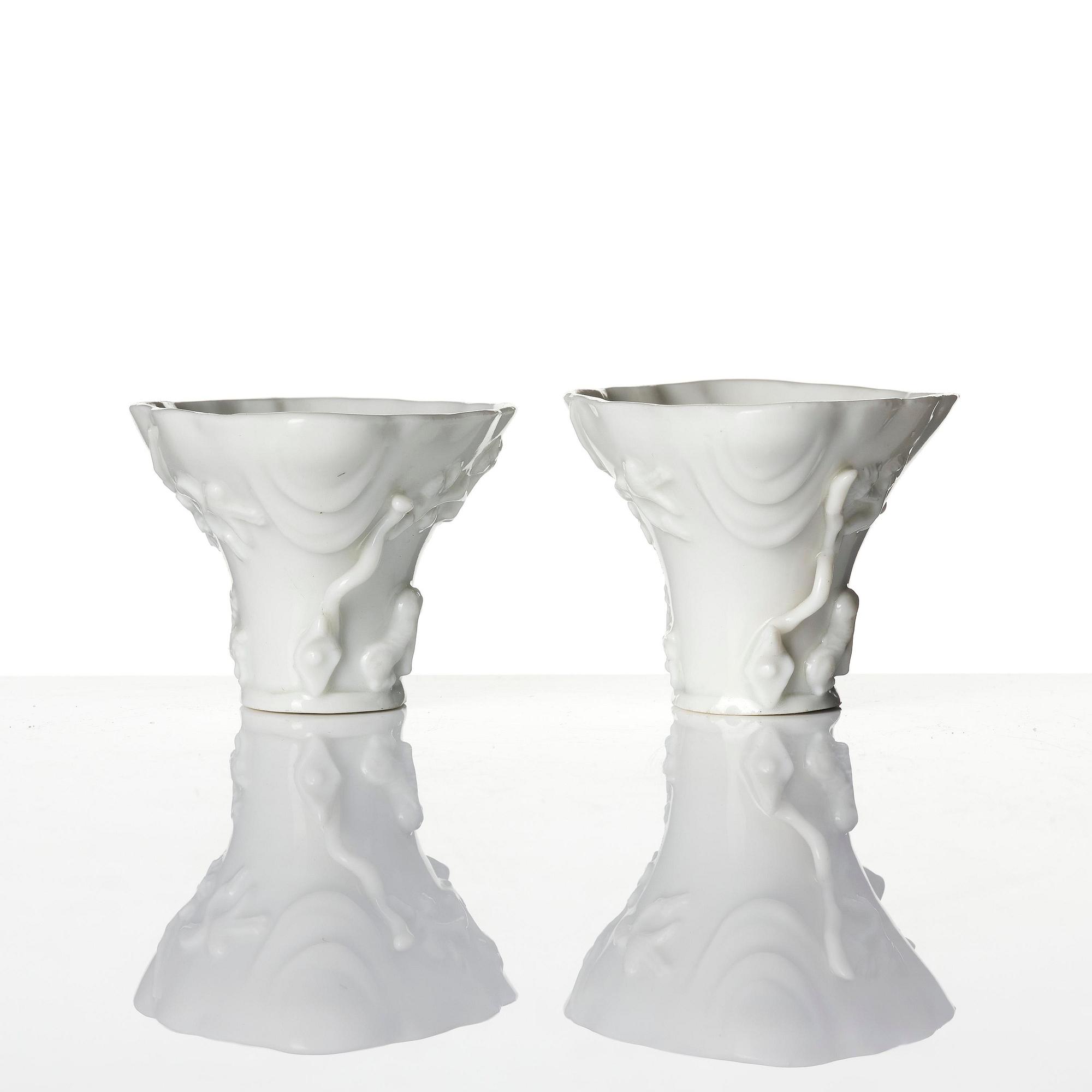 Two blanc de chine rhinoceros libation cups, Qing dynasty, Kangxi (1662-1722).