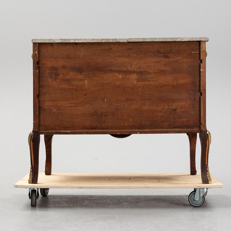 A late Gustavian style chest of drawers, from around the year 1900.