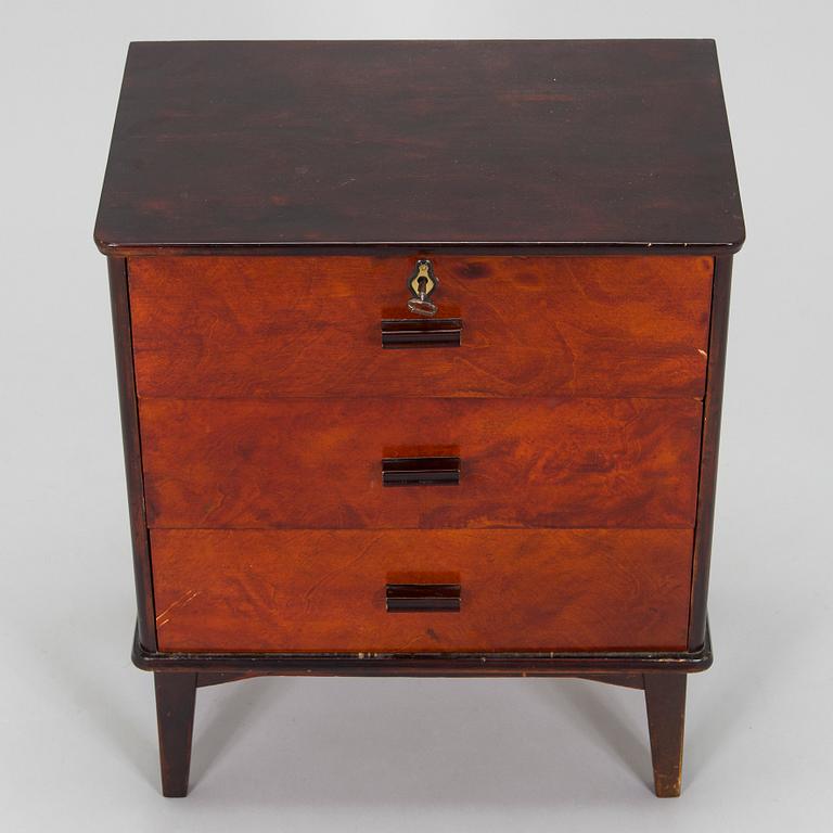 A 1930s functionalist style chest of drawer.