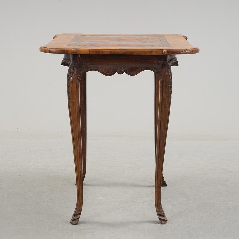 A mid 18th century rococo table.