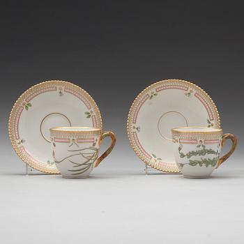 A set of eight cups with stands and six dessert dishes, Royal Copenhagen, 'Flora Danica', 20th Century.