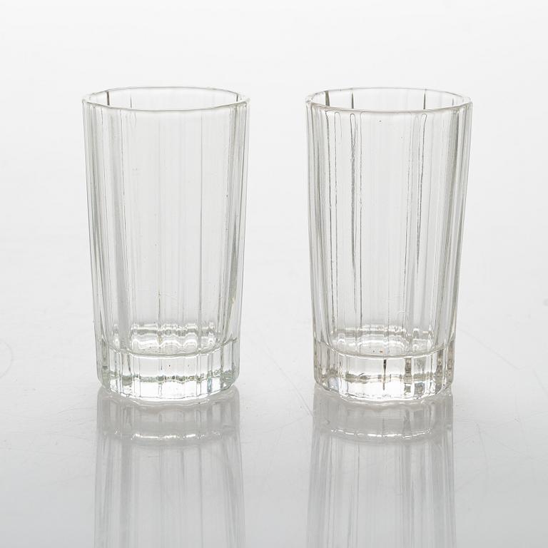 Heikki Orvola, two sets of 70s 'Spektro' schnapps glasses for Arabia, in wood boxes, four and two in each.