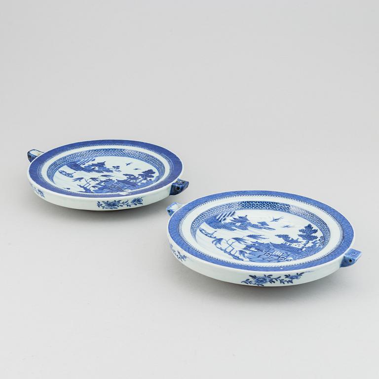 A pair of blue and white hot water dishes, Qing dynasty, Jiaqing (1796-1820).