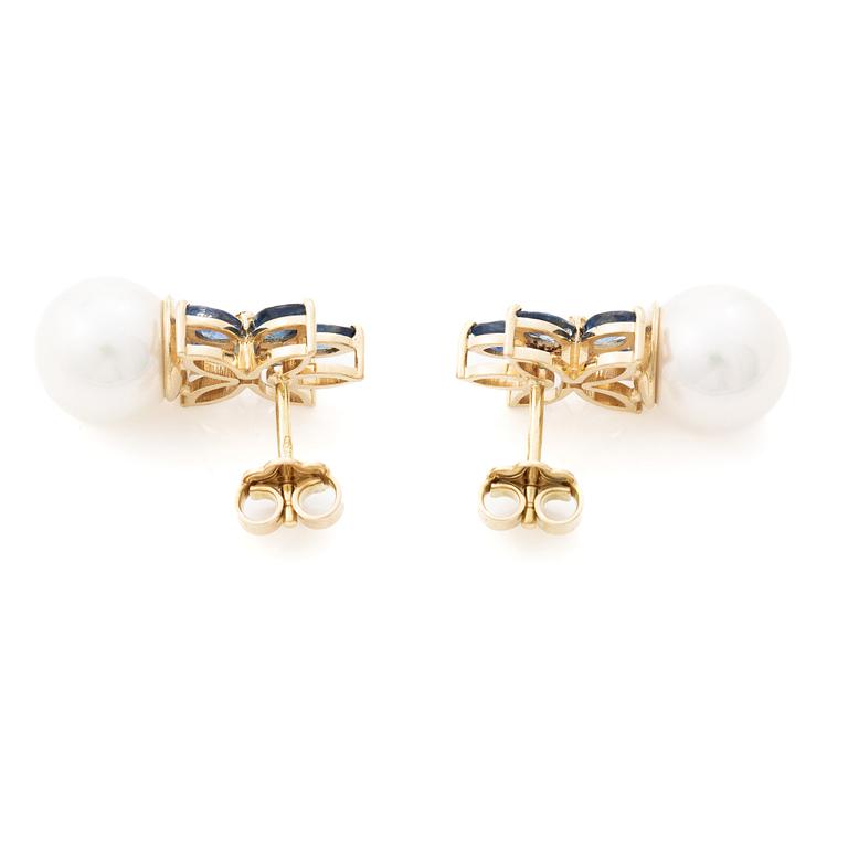 18K gold earrings with cultured Akoya pearls and navette-cut sapphires.