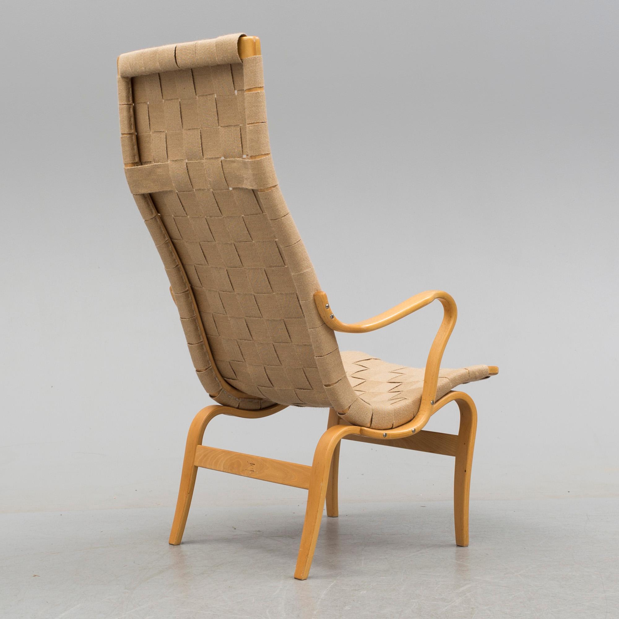 BRUNO MATHSSON, an 'Eva Hög' beech easy chair from Firma Karl Mathsson, Värnamo, 1971.