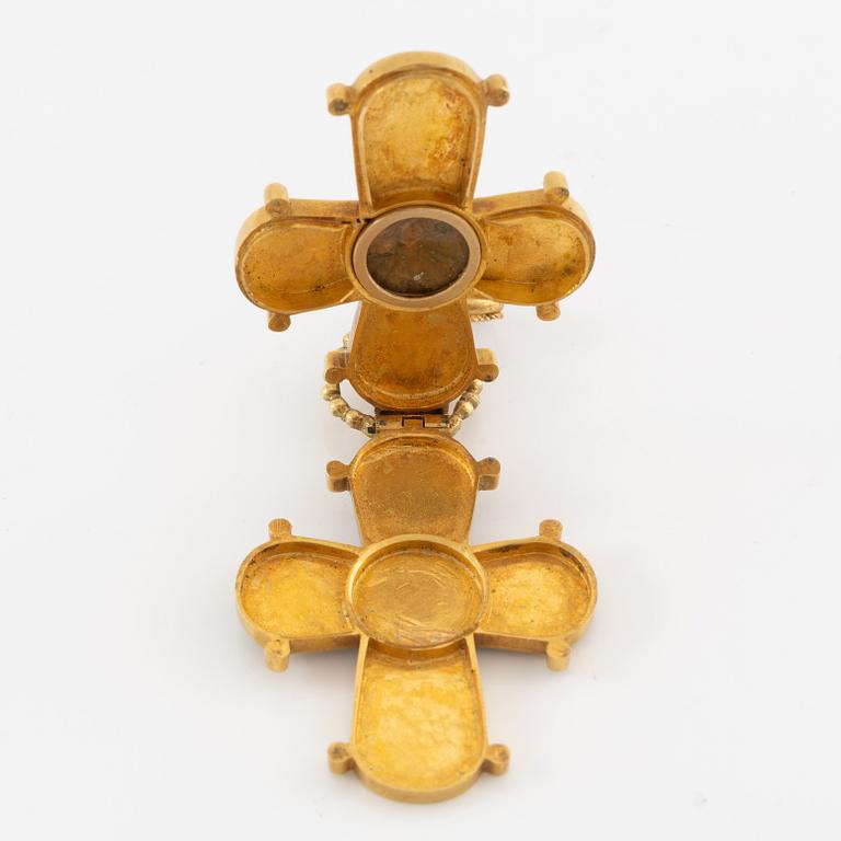 Cross 18K gold with enamel and white stone with relic compartment.