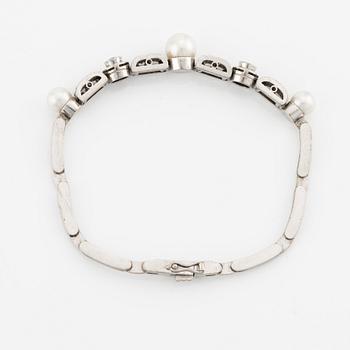 Armband/tiara, med pärlor, gammalslipade och rosenslipade diamanter.