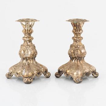 A pair of Swedish silver candlesticks, bearing the mark of GAB Stockholm, 1949.