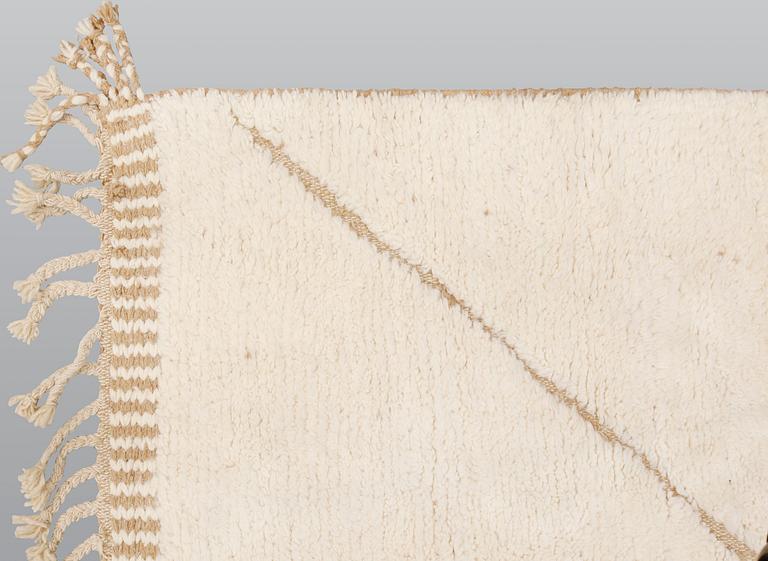 A Moroccan carpet, c 358 x 261 cm.