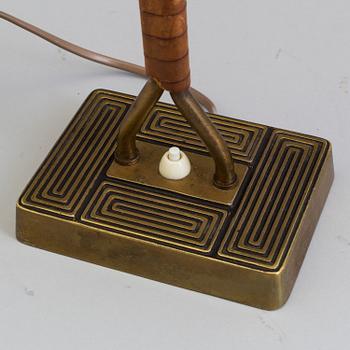 A 1940s Sonja Katzin brass table light from Asea.