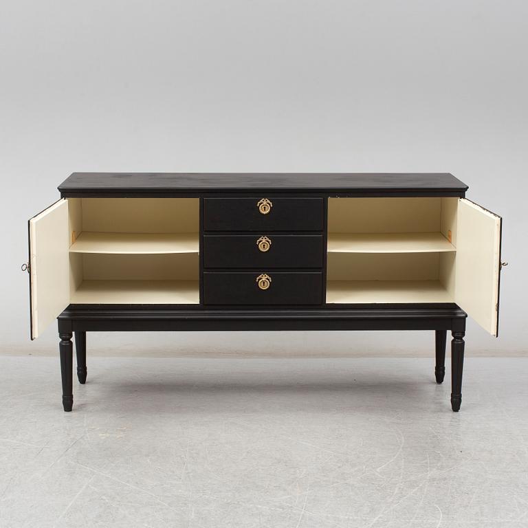 A mid 20th century painted sideboard.