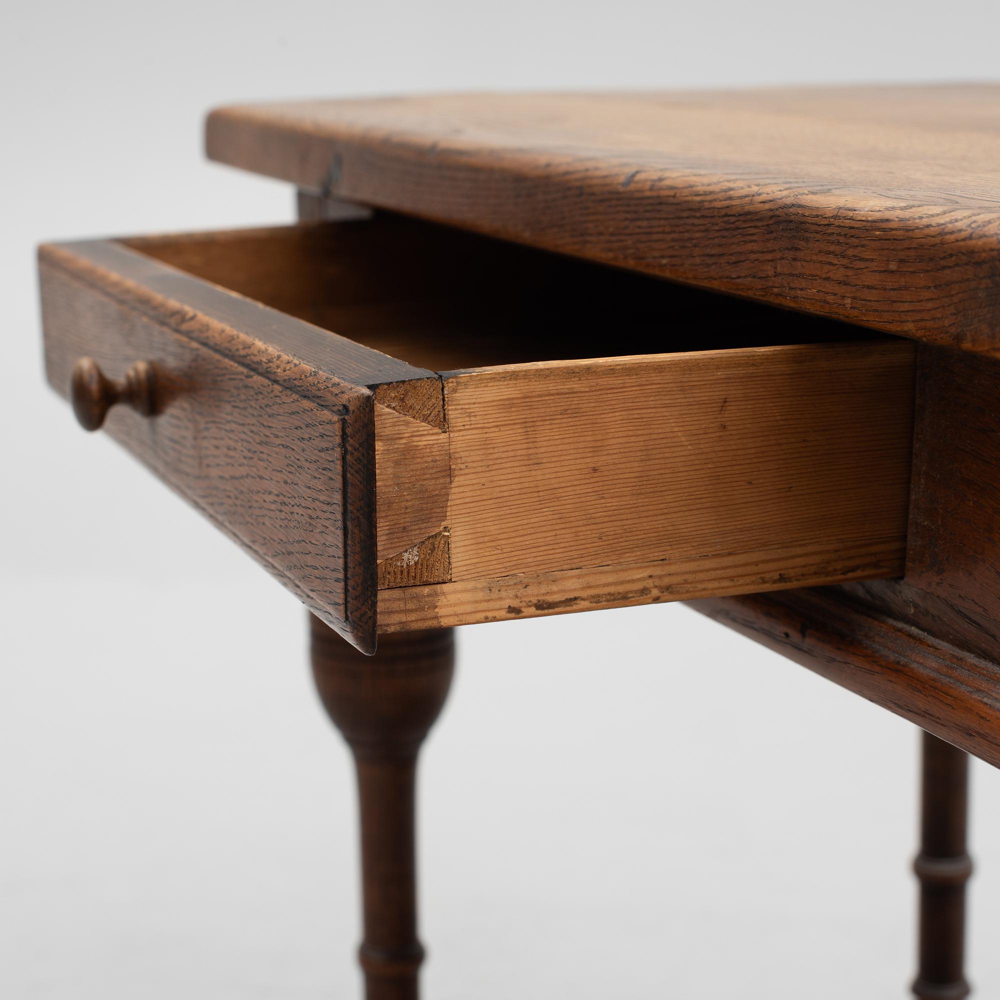 A table, late 19th century. Baroque style.