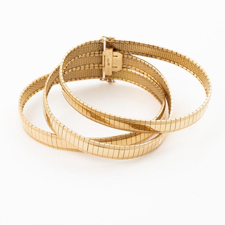 18K gold bracelet.