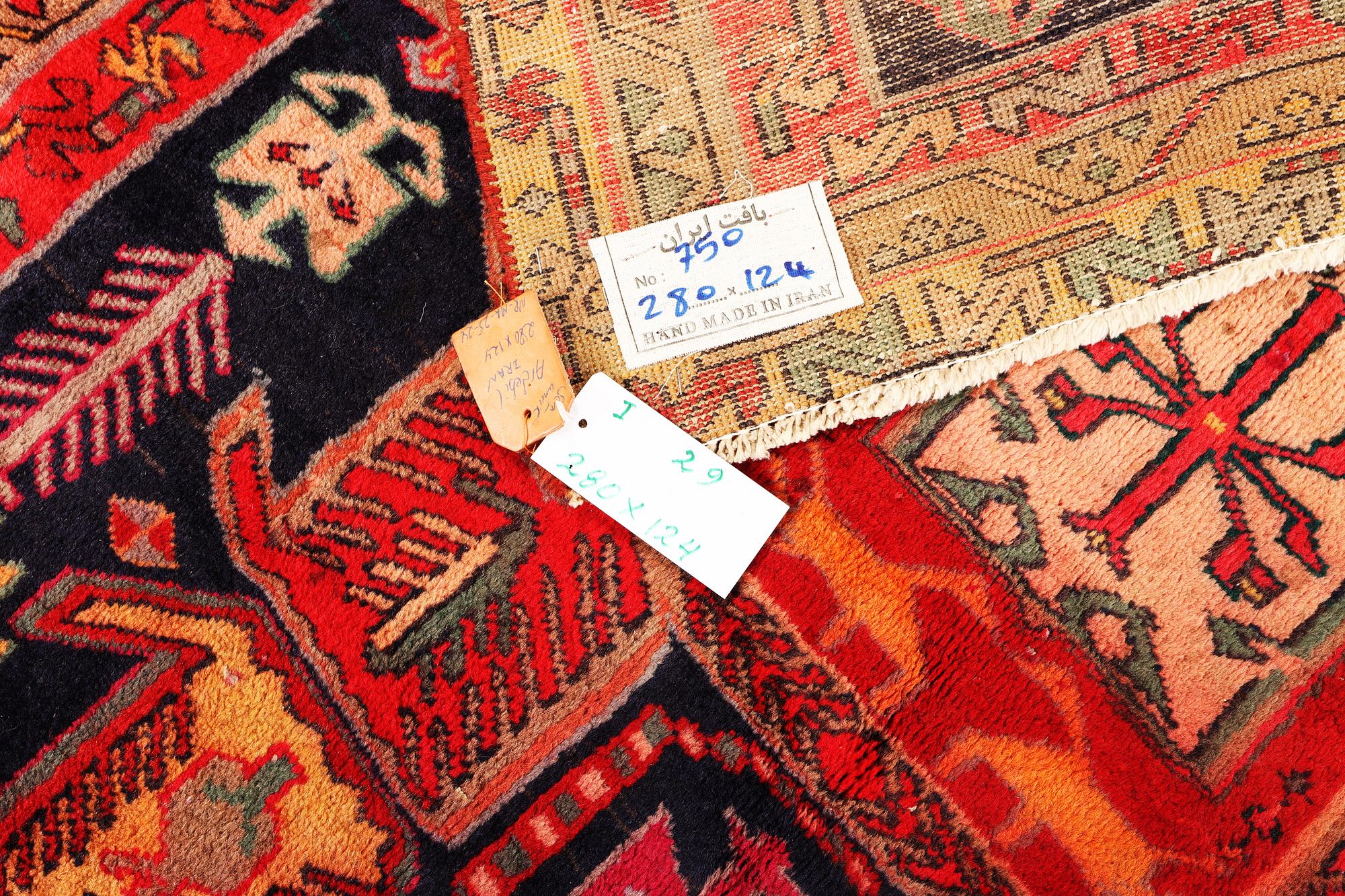 An Ardabil carpet, c. 280 x 124 cm.