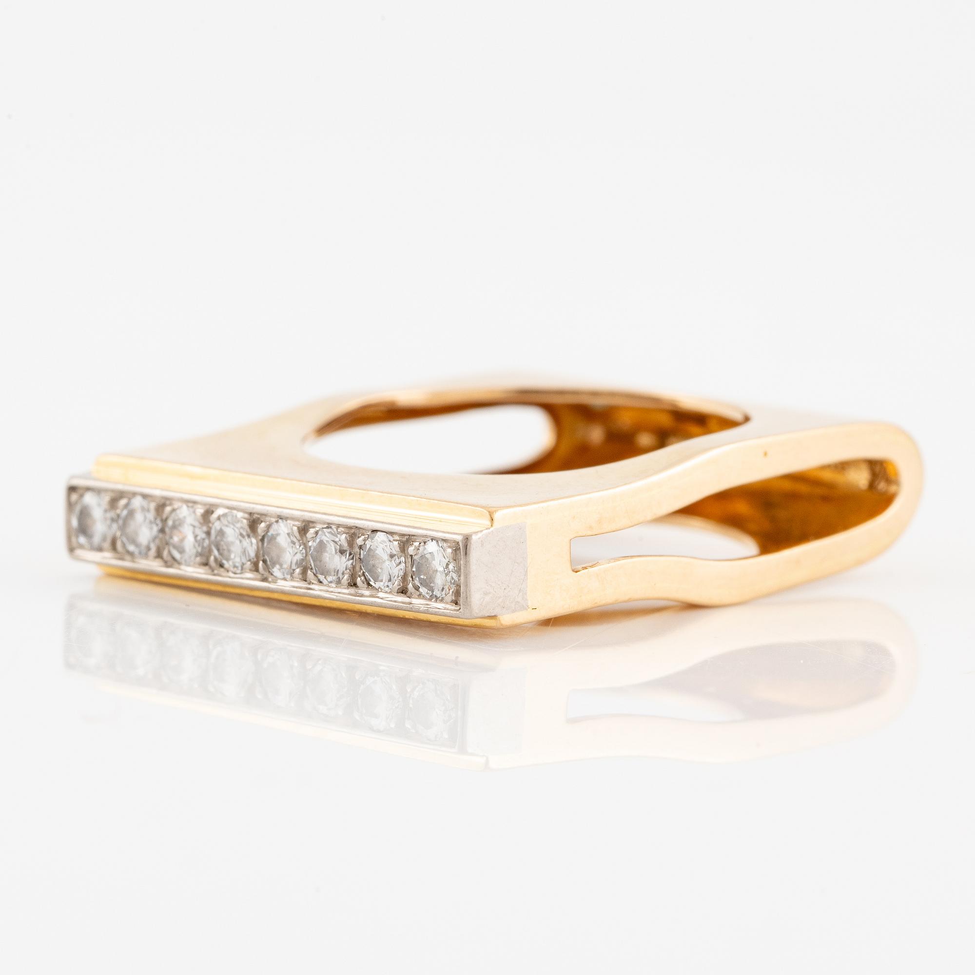 A W.A. Bolin ring in 18K gold set with round brilliant-cut diamonds.