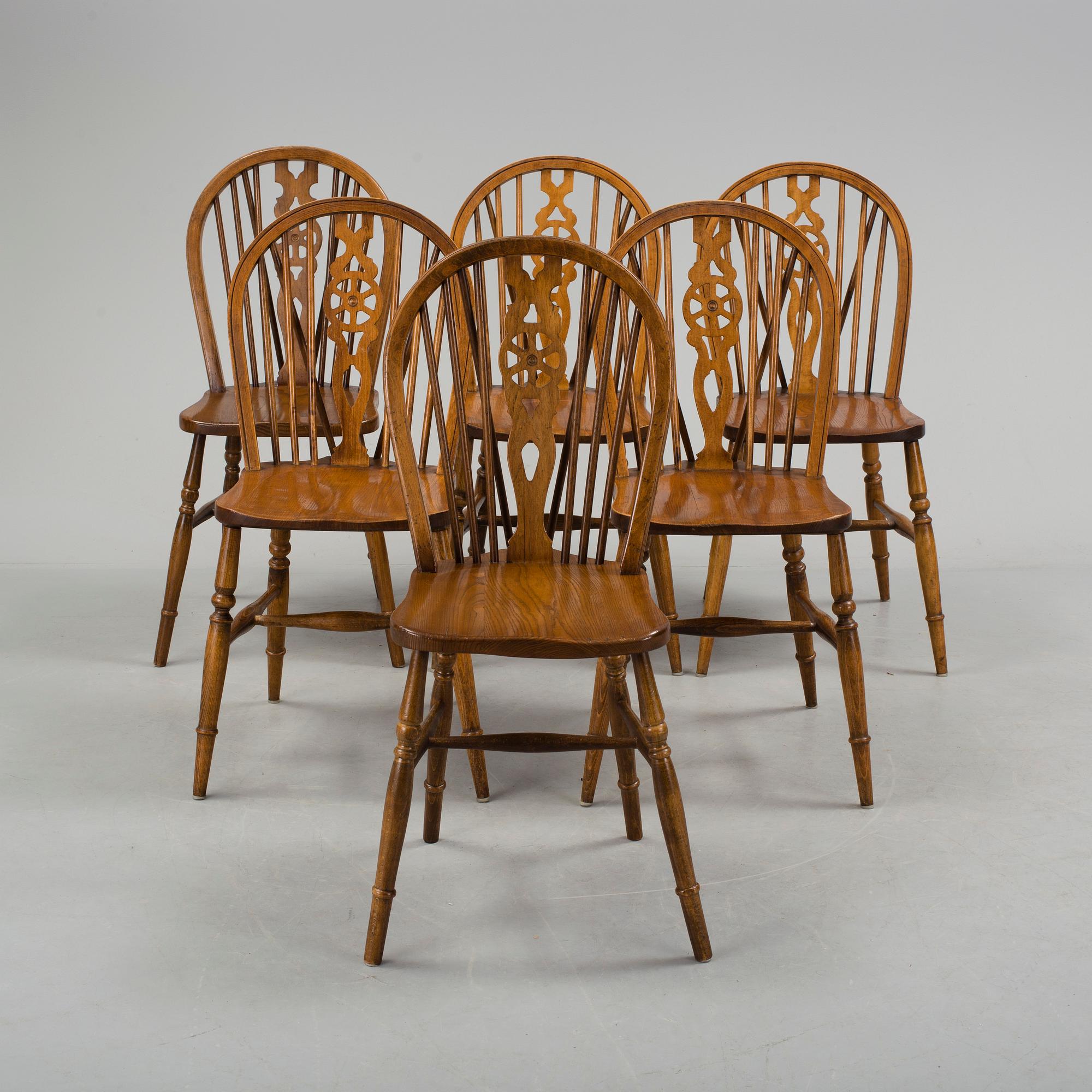 Six oak chairs from Reprodux, second half of the 20th century.