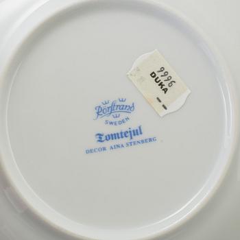 A 20th century set of 24 pices earthenware tableware, "Tomtejul", Aina Stenberg, Rörstrand.