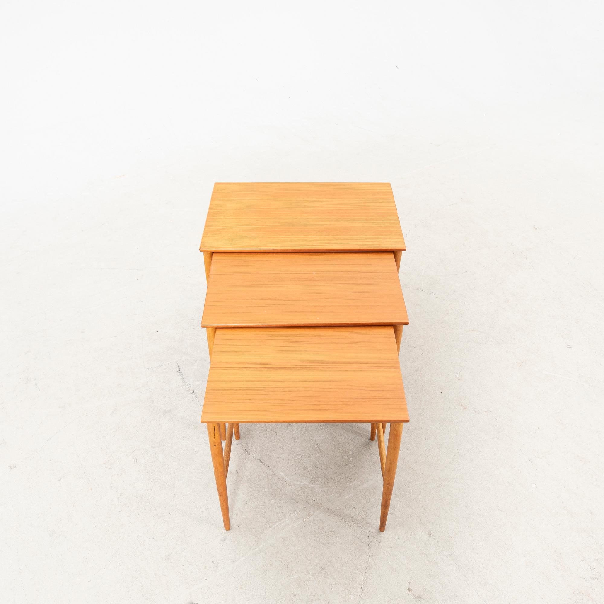 A set of three teak and oak Bertil Fridhagen nesting tables from Bodafor.