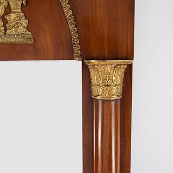 An Empire mirror and console table, first half of the 19th century.