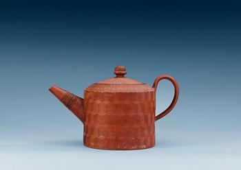 A Yixing pottery teapot, Qing dynasty, 18th Century.