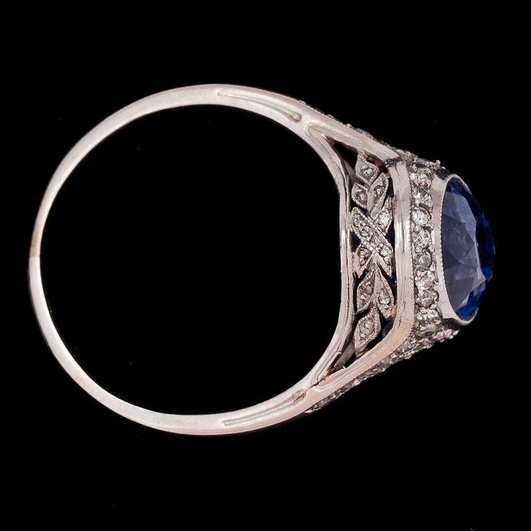 A blue sapphire and diamond ring, 1920's.