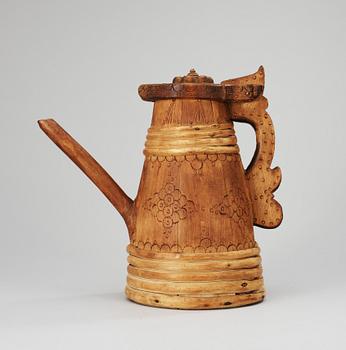 A 19th century wood jug.