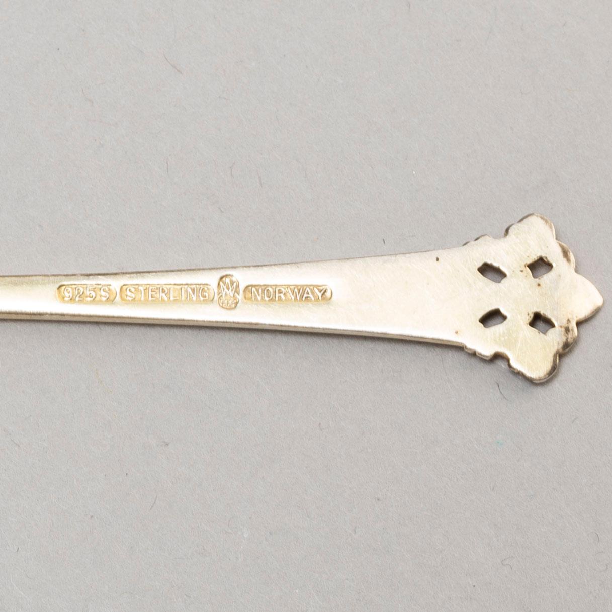 Twelve sterling silver and enamelled spoons, Norway.