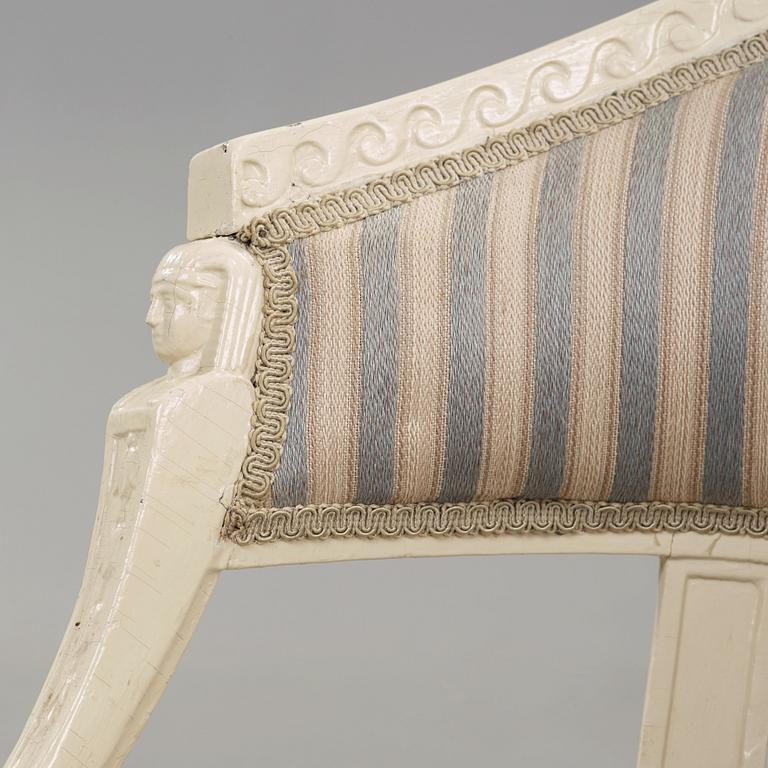 A pair of late Gustavian armchairs in the manner of Ephraim Ståhl, master in Stockholm 1794-1820.