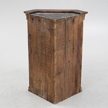 A 18th century corner cabinet.
