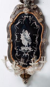 A pair of Venetian four-light girandole mirrors attributed to Briati family, circa 1730.