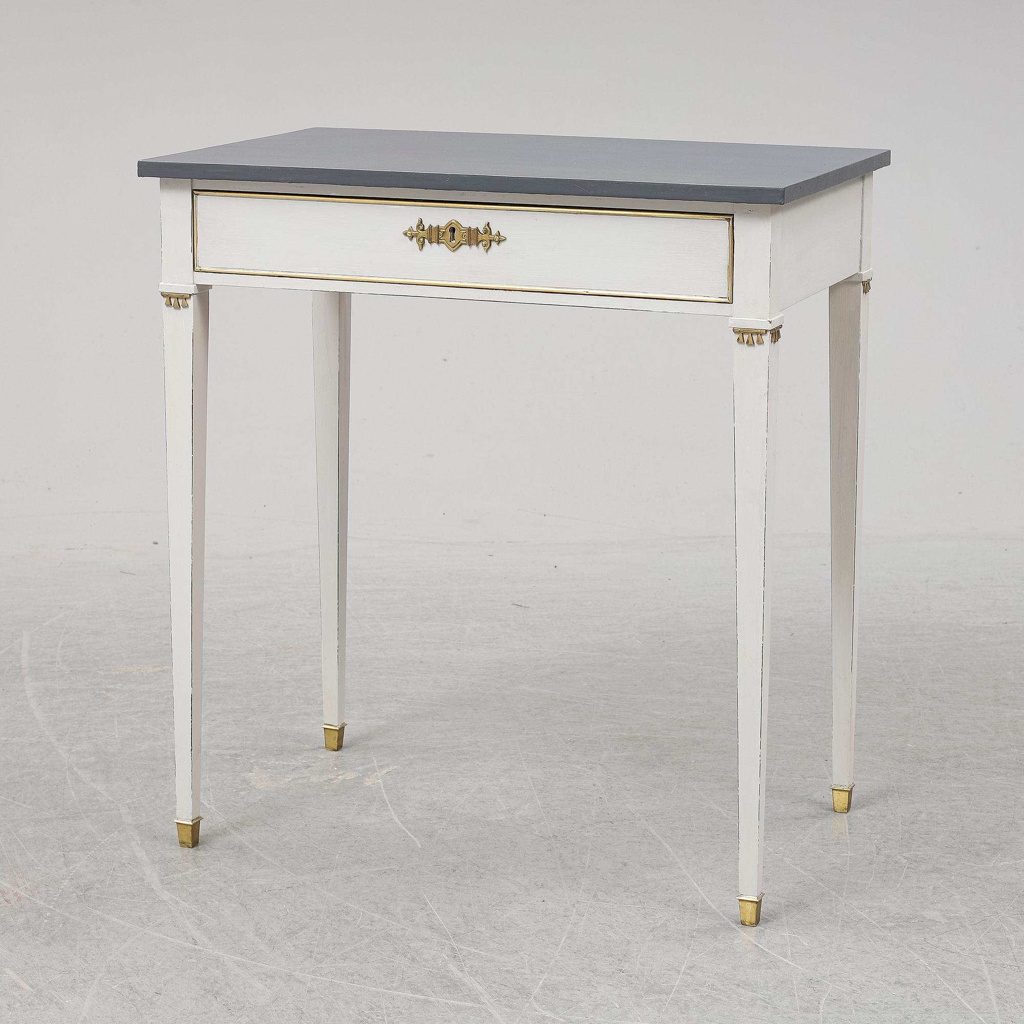 A Gustavian style table, first half of the 20th century.