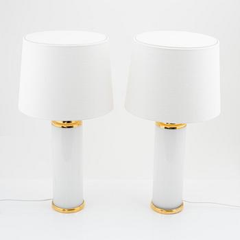 A pair of white and gold glass table lights, Luxus.