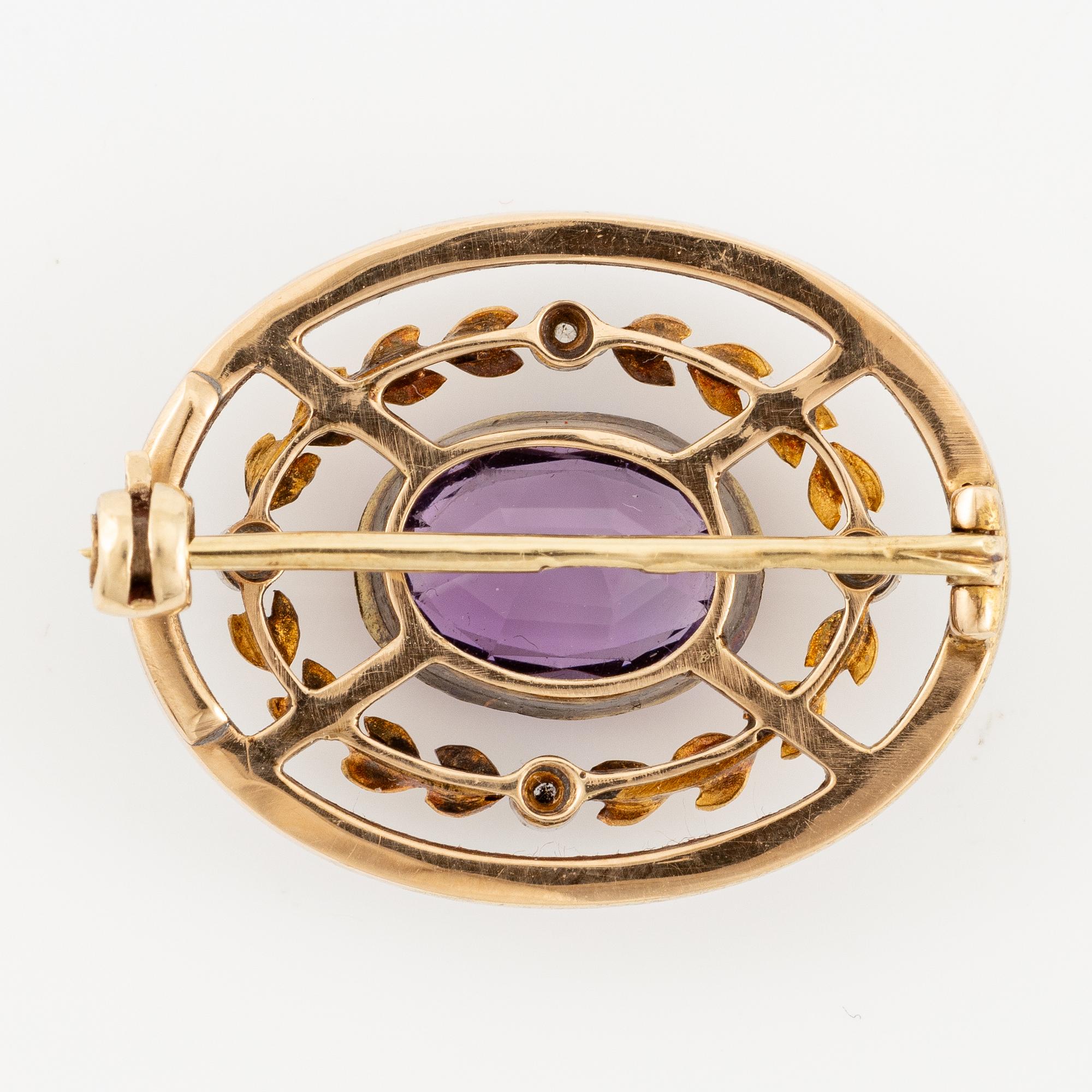 A Fabergé jewelled gold and enamel brooch, workmaster Mikhail Perkhin, St Petersburg, 1895-1903.