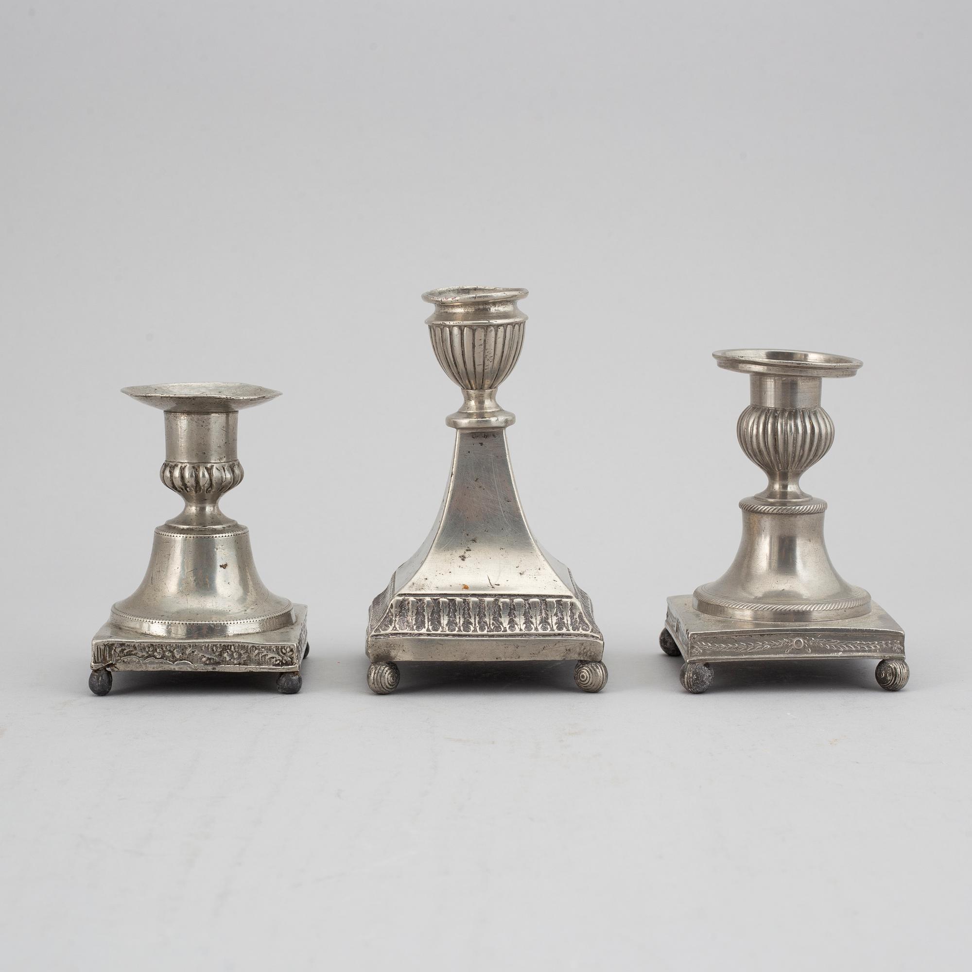 7 pewter candlesticks, 19th Century. (2+2+2+1).