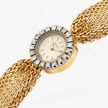 584A. Piaget, armbandsur 18K guld och runda briljantslipade diamanter med länk av W.A. Bolin.