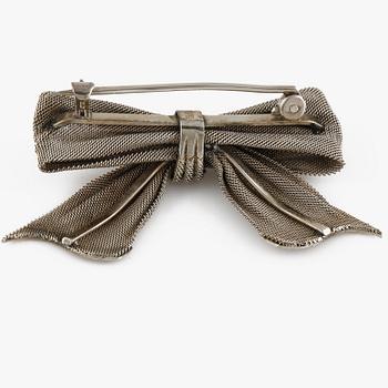 BROSCH, 14K vitguld. Vikt 6,5 gram.