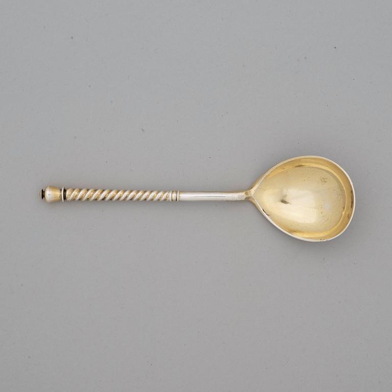 A Russian 19th century parcel-gilt caviar-spoon, marks of S. Stroganov, Moscow 1877.