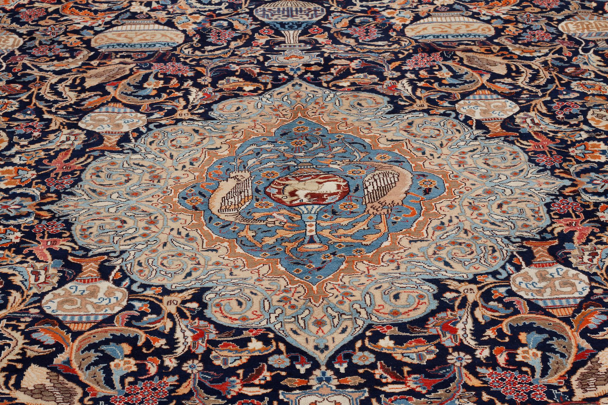 A Kashmar rug, 392 x 300 cm.