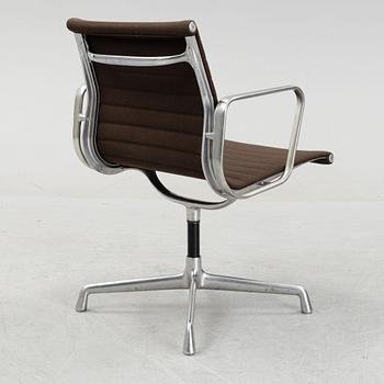 A model EA 108 swivel armchair by Charles and Ray Eames for Herman Miller, designed 1958.