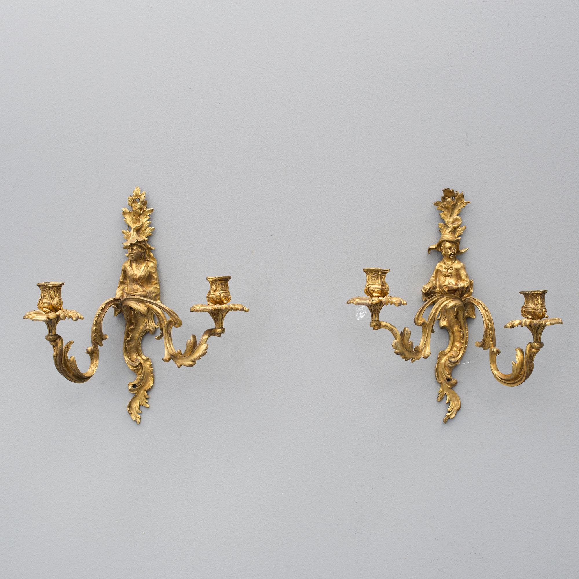 APPLIQUER, för två ljus, ett par. Louis XV-stil, 1800-tal.