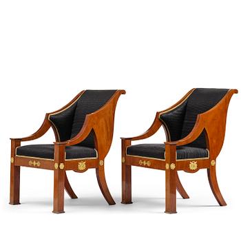 218. A pair of Swedish Empire mahogny armchairs, Stockholm, first half of the 19th century.