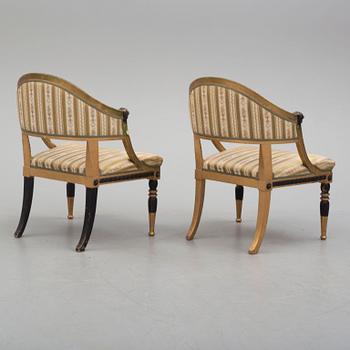 A pair of Gustavian style armchairs.