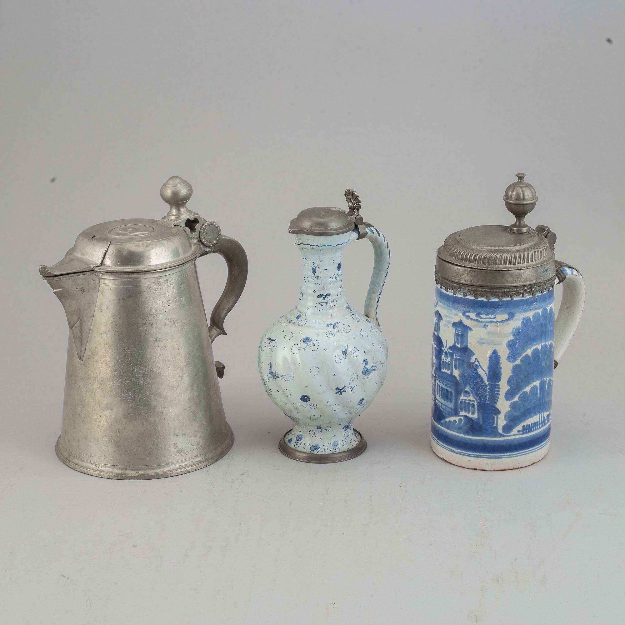 A group of three pewter and faience ewers, Holland/Germany, 18th/19th Century.